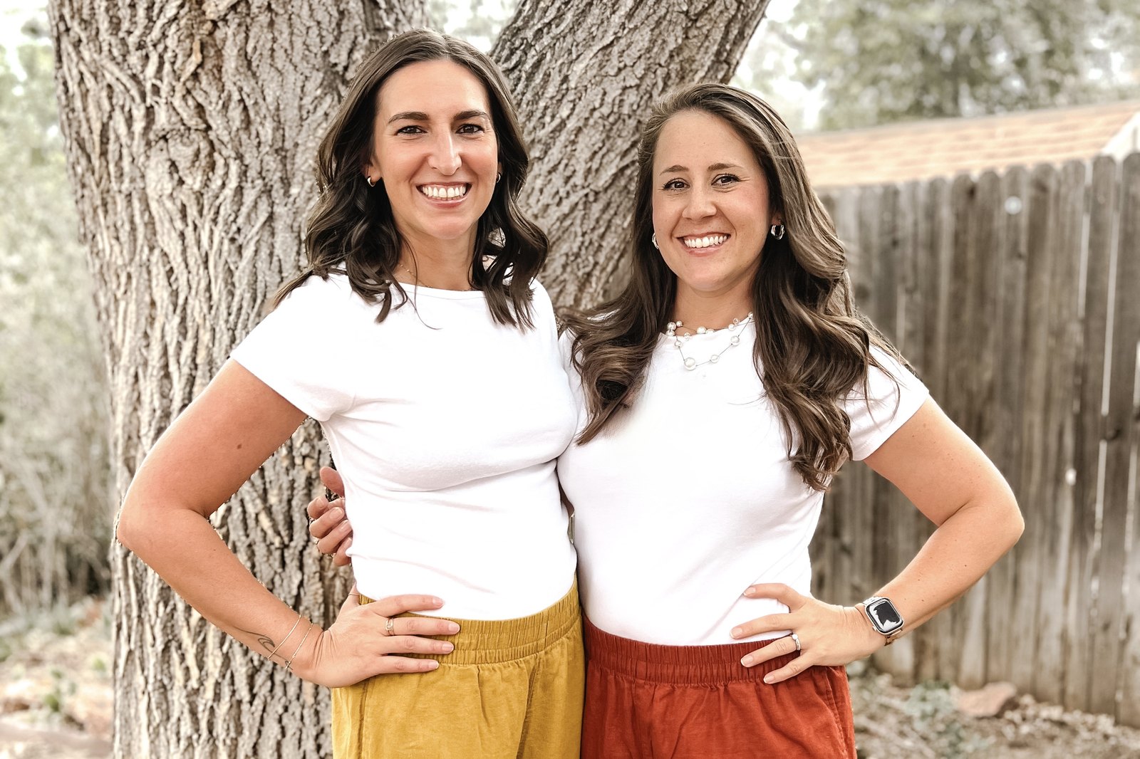 Ashley LeRossignol and Shayla Martinez-O&rsquo;Brien, co-facilitators of Mama&rsquo;s Golden Hour, standing together outdoors beneath a cottonwood.